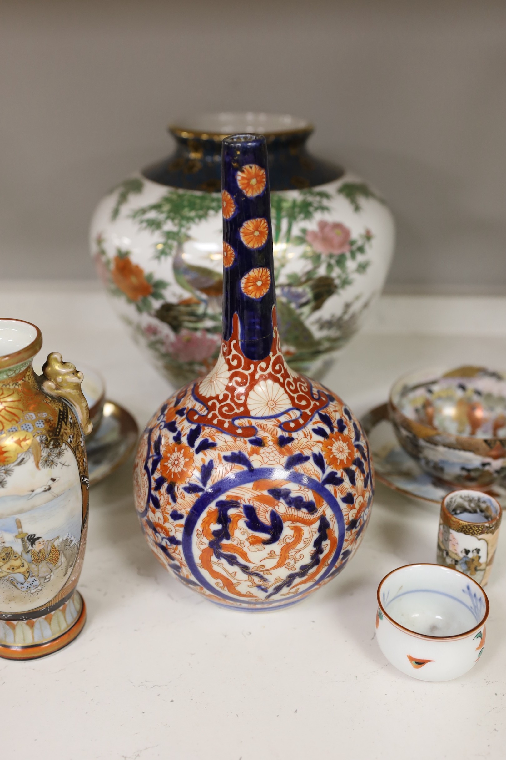 Assorted Japanese ceramics including an Imari bottle vase, a Satsuma vase and Kutani eggshell porcelain